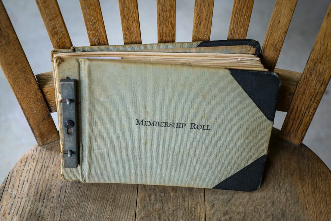 "Vintage book titled 'Membership Roll' symbolizing Premier Autos Detailing's valued subscribers."