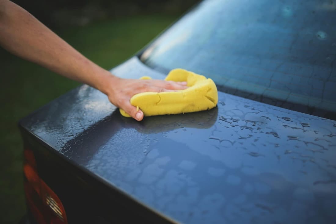 Car being hand-wiped for professional 'paint protection' at Premier Autos Detailing in 'West Plains, MO.'