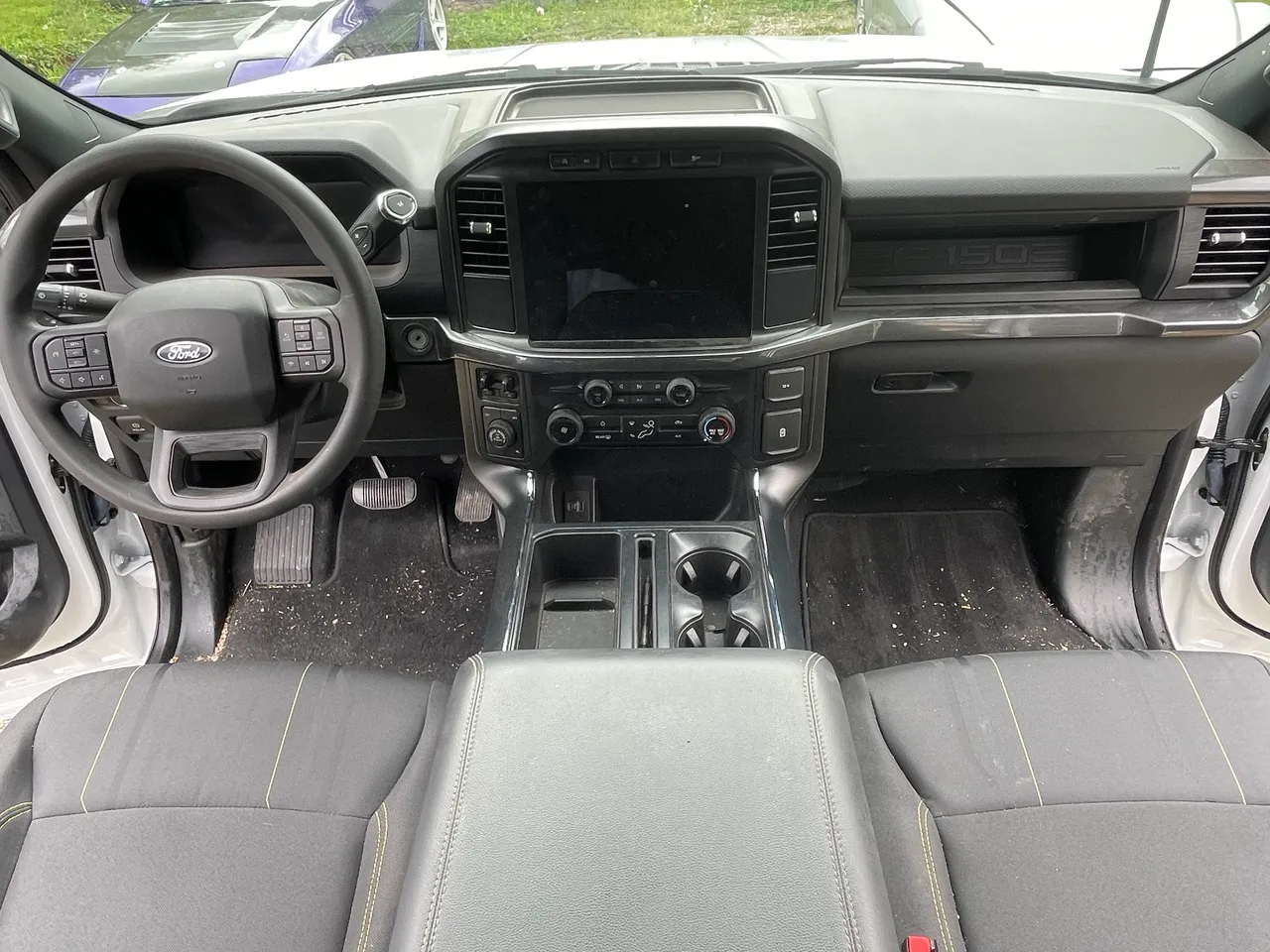 Before: Ford F-150 front cabin before and after detailing in West Plains, MO
