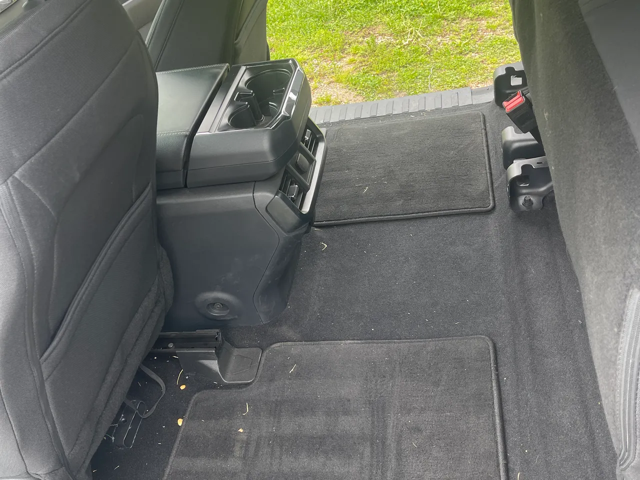 Before: Ford F-150 rear floor before and after detailing in West Plains, MO