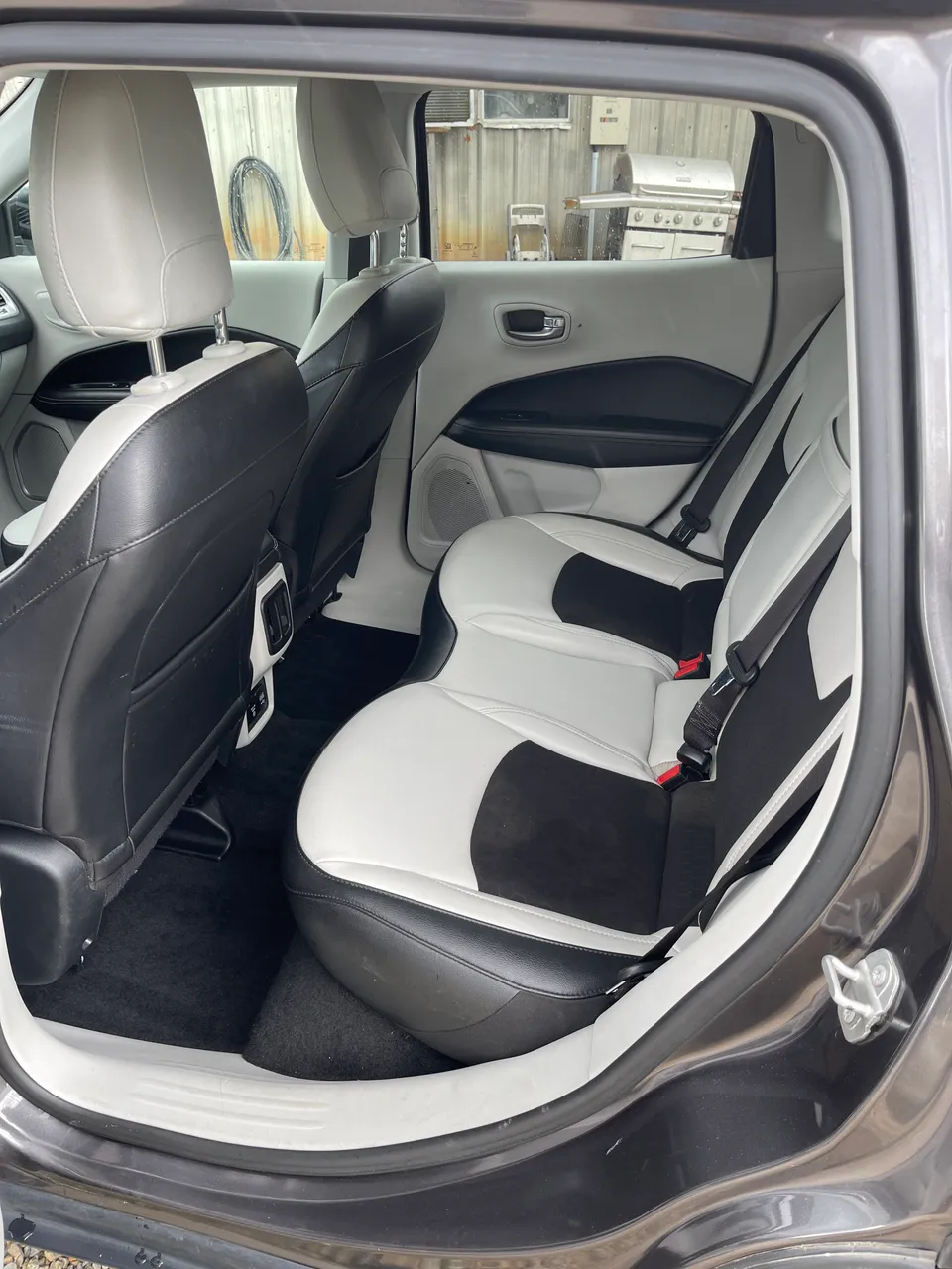 Two-tone leather rear seats of a Jeep Compass after detailing in West Plains, MO
