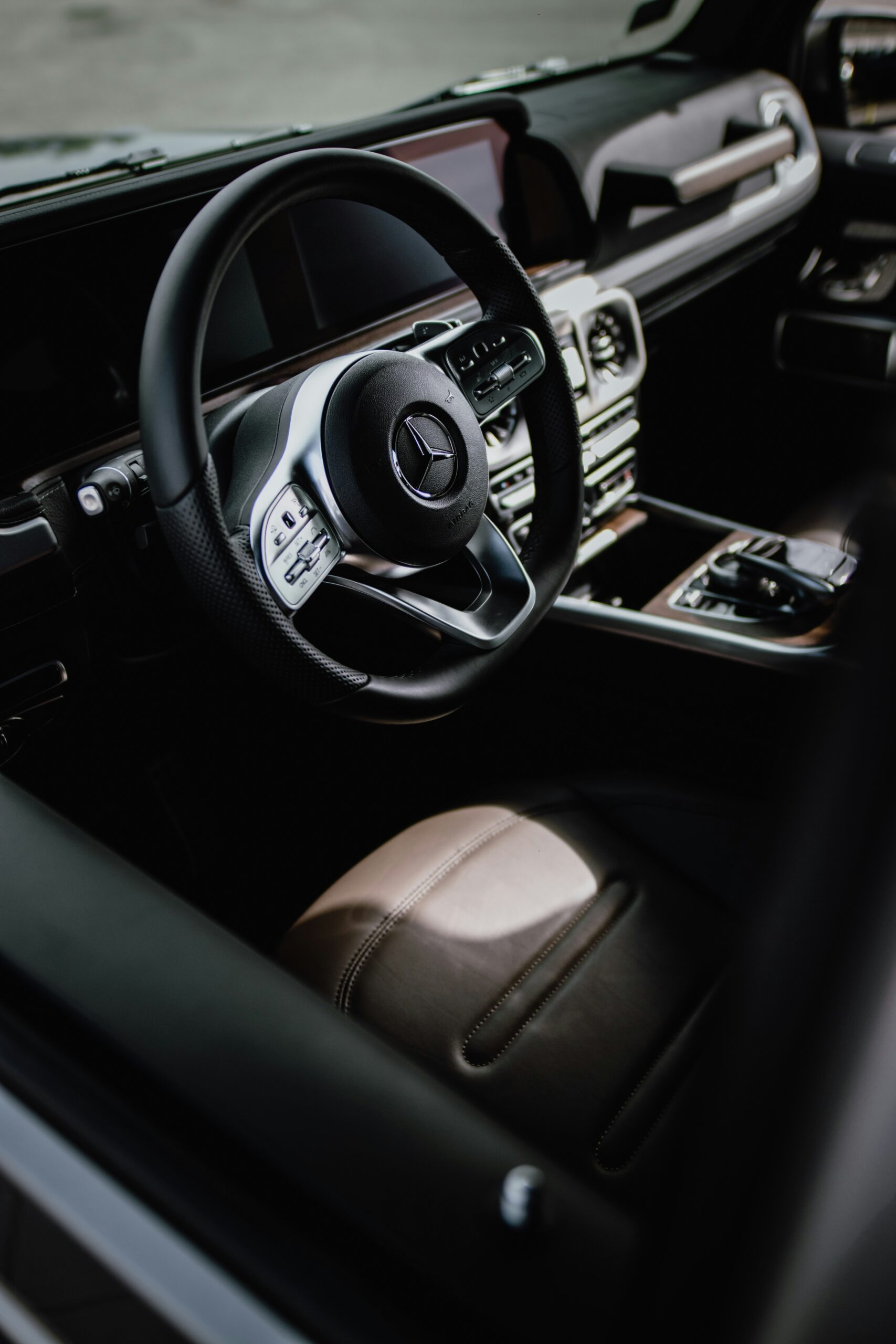 roland-denes-CoCQWAQrhbo-unsplash "Interior of a Mercedes spotless after detailing by Premier Autos Detailing, showcasing clean seats, dashboard, and windows for a refreshed, polished look."