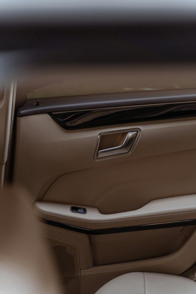 Close-up of clean car door panel with detailed interior cleaning
